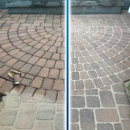 Before and after paver driveway cleaning showing restored decorative brick pattern